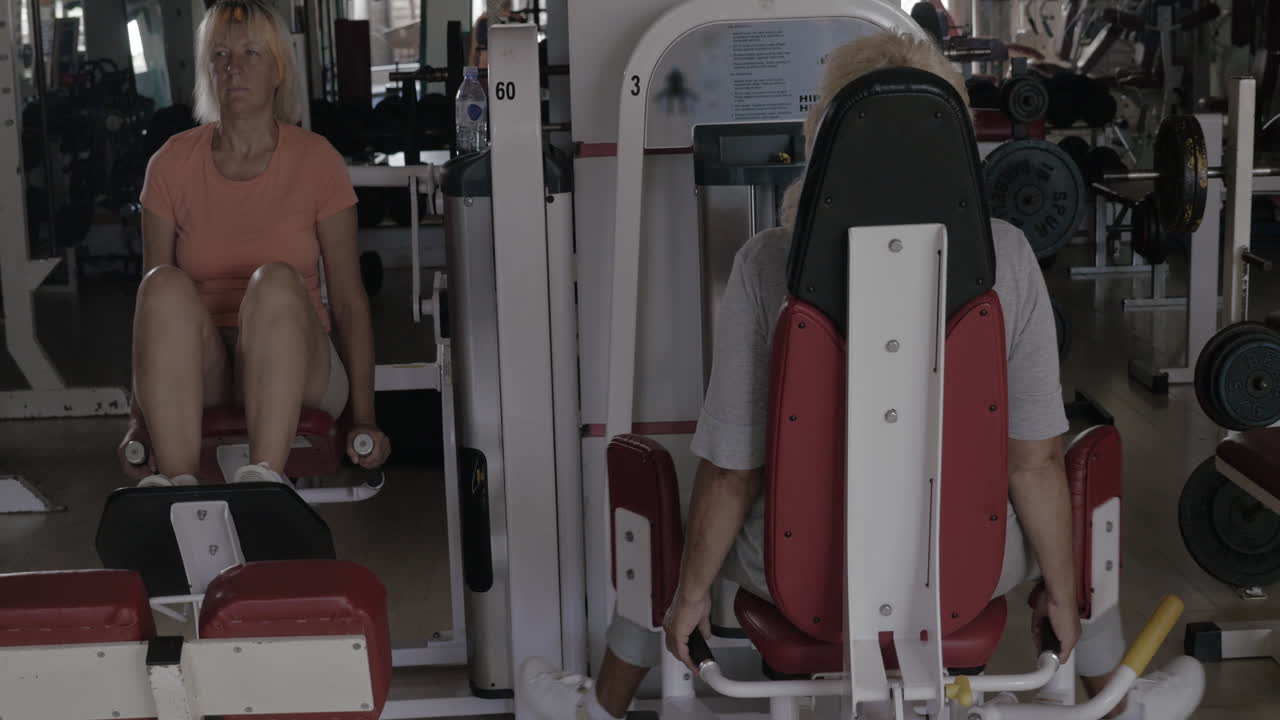 Senior women exercising in fitness centre
