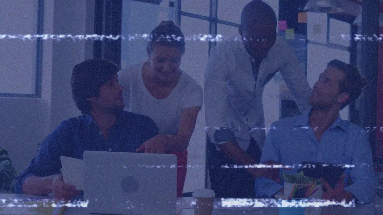 Animation of interference over diverse business people using tablet and laptop