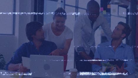animation of interference over diverse business people using tablet and laptop