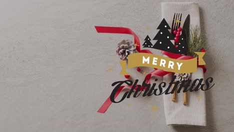 Animation-of-christmas-greetings-text-over-christmas-place-setting