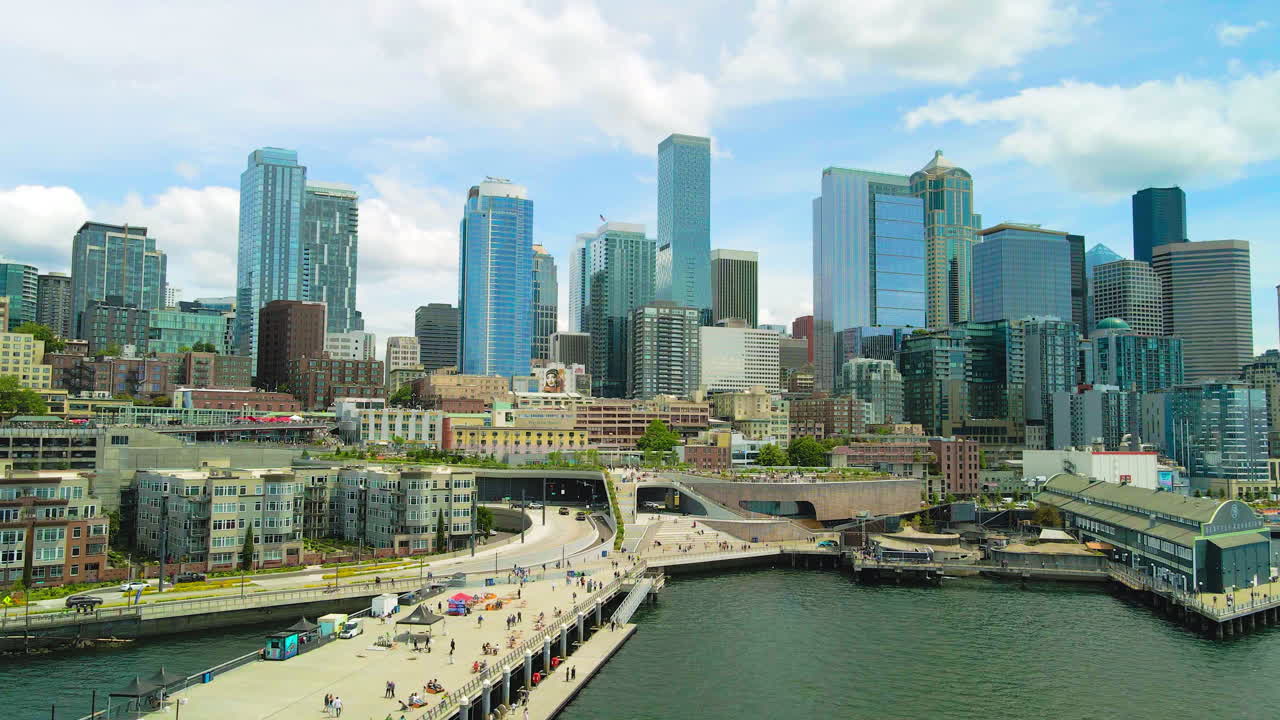 Aerial drone fly Seattle Downtown Waterfront drone view , Washington State downtown skyline establishing shoot
