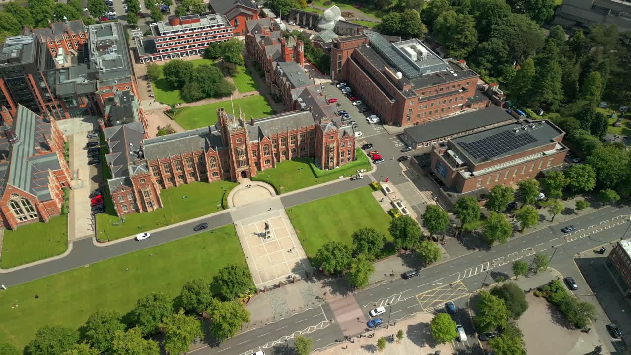 Reversing overhead aerial video of Queen's University Belfast, in Northern Ireland, UK on a bright and sunny day. Produced at 4K resolution, 60FPS and with Rec709 color.