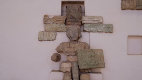 mayan warrior representation made with stone at copan