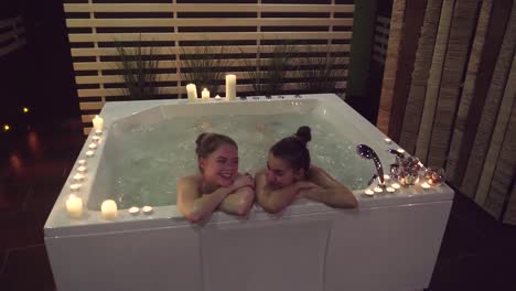two women enjoying a spa hot tub experience
