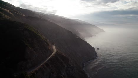 epic misty aerial view of santa lucia mountains and pacific ocean at big sur, california