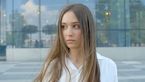 woman staring at the camera, static closeup