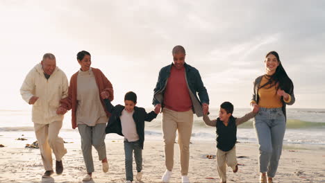 beach, holding hands and big family running