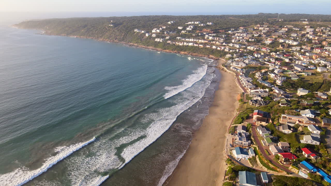 Scenic stretch of white sand beach at holiday town of Vleesbaai, high aerial