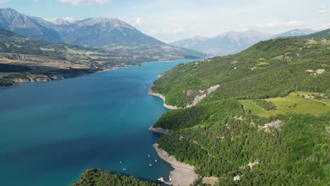 Lake-Serre-Poncon-and-Nature-Landscape-in-French-Alps,-France---Aerial-4k