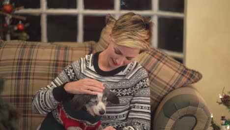 woman with dog at christmas