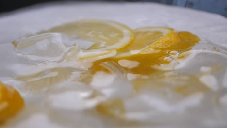 fresh lemon slices on ice