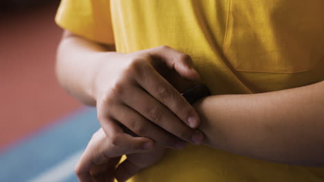 boy setting fitness watch