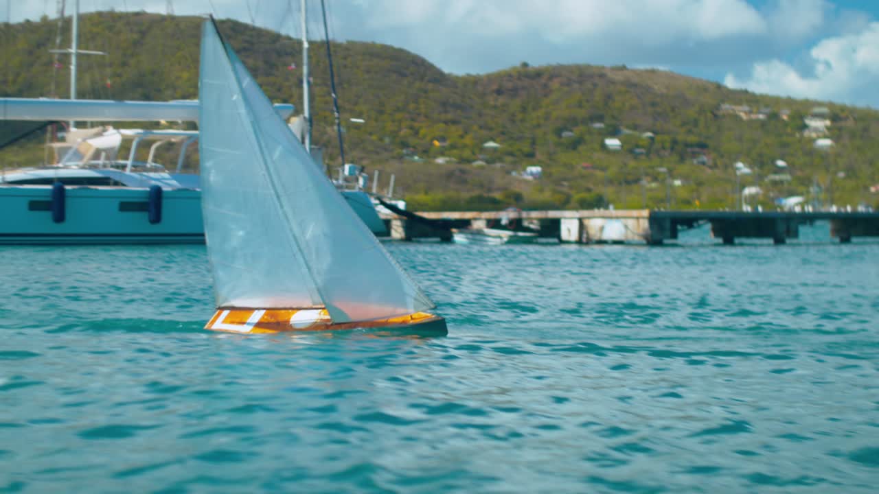 Model Sailboat on the Water