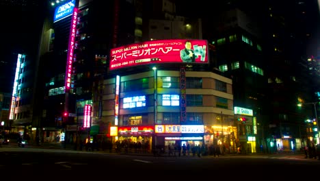 night lapse with japanese neons at south shinjuku wide shot