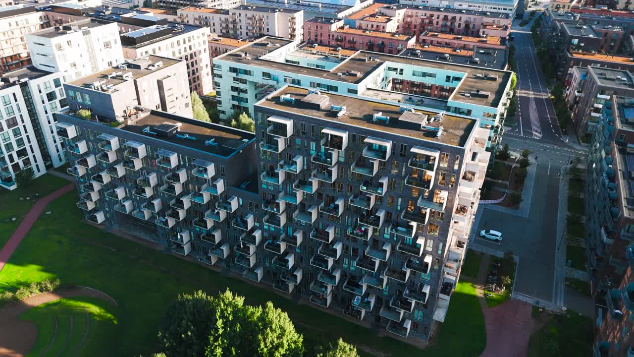 Aerial View of Modern Apartment Building with Numerous Balconies