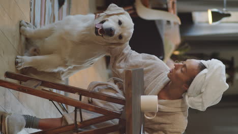 woman and dog enjoying a morning at home