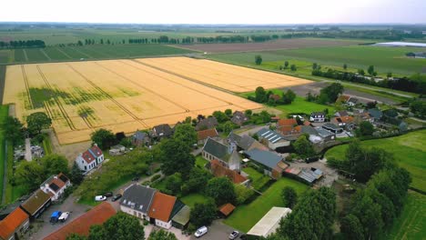 The-historic-village-church-of-Cillarshoek-in-the-Netherlands,-founded-in-the-year-1838,-rear-view-with-wooden-bell-tower,-covered-with-slates