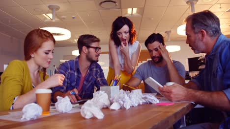 Business-colleagues-interacting-with-each-other-in-the-meeting