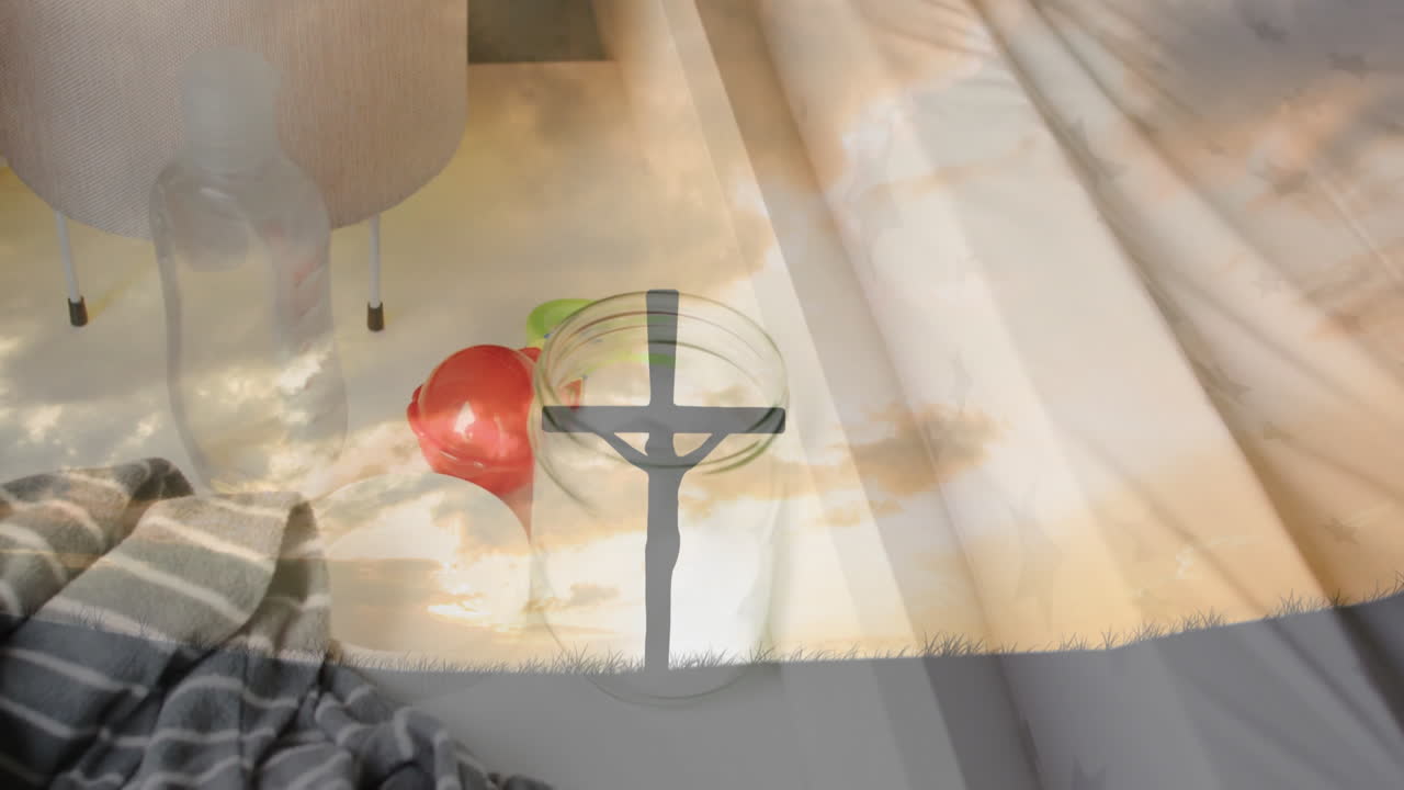 Cross silhouette with apple and striped fabric on clouds, creating animation effect