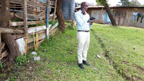 An-African-drone-pilot-flying-drone-in-rural-Africa