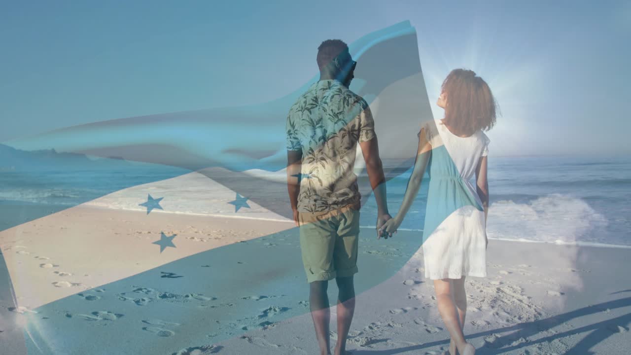 Couple holding hands walking on beach, footsteps appearing and flag overlay drifting for travel