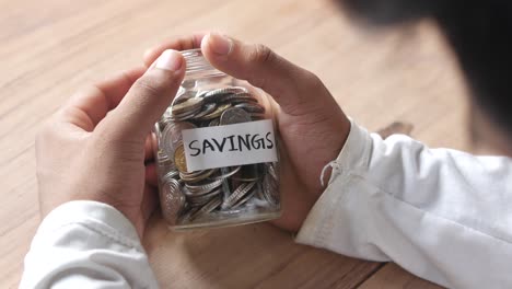 saving money in a jar