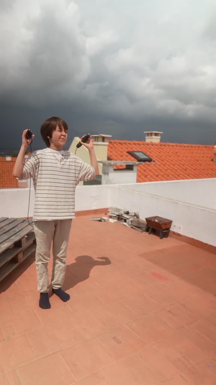 Boy Jumping Rope on a Rooftop