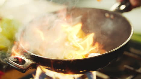 stir-frying vegetables with flames