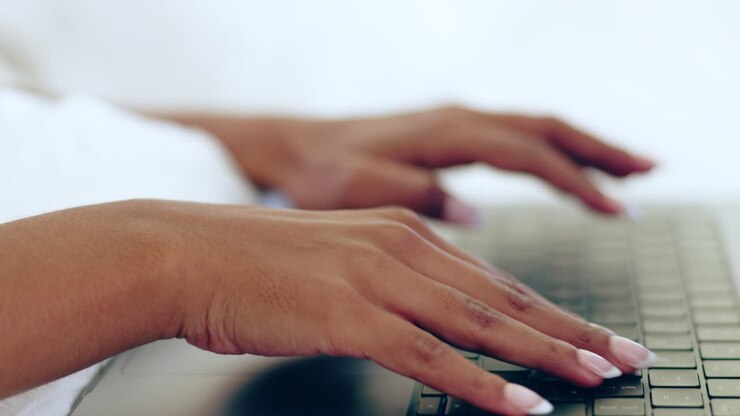 Home, woman and hands with a laptop