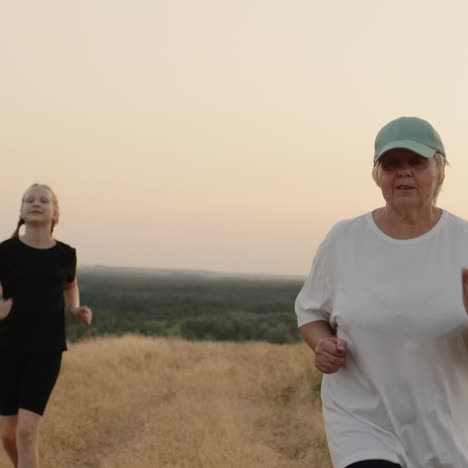 an active senior woman on a run her granddaughter catches up