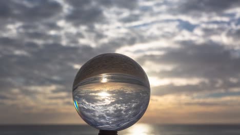 time lapse view of beautiful nature at sunset in crystal ball.