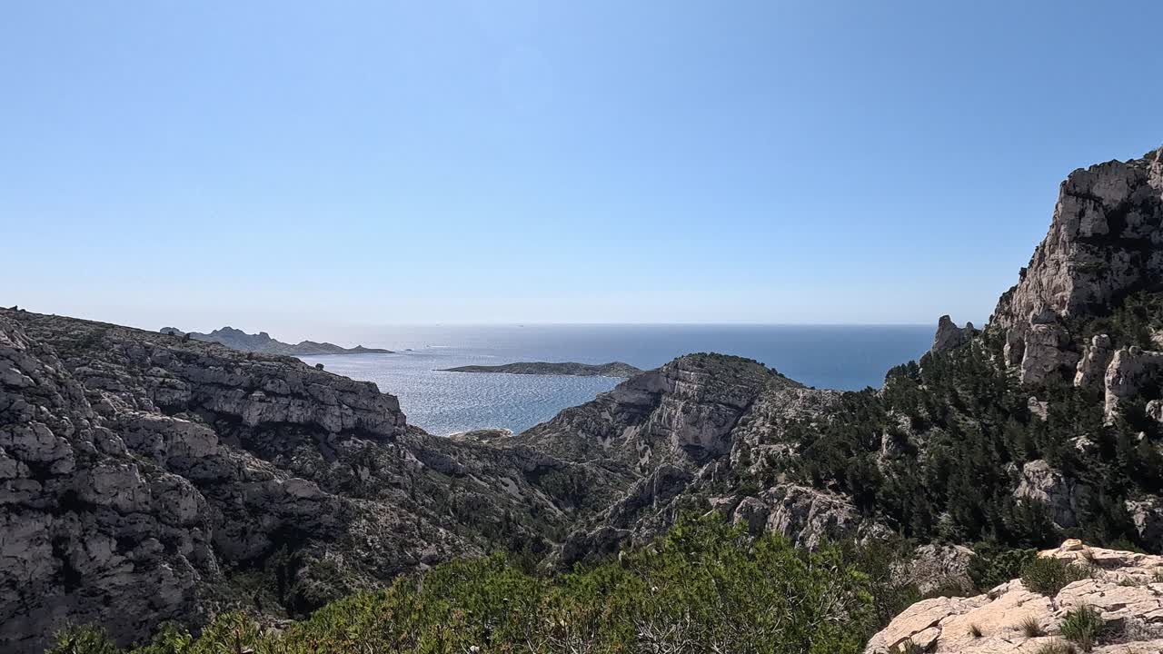 Dramatic coastal cliffs and sea view from Les Calanques National Park near Marseille, France with Mediterranean waters and rugged limestone formations