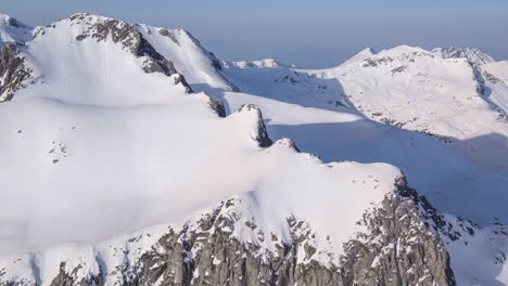 snowy mountain peaks aerial view