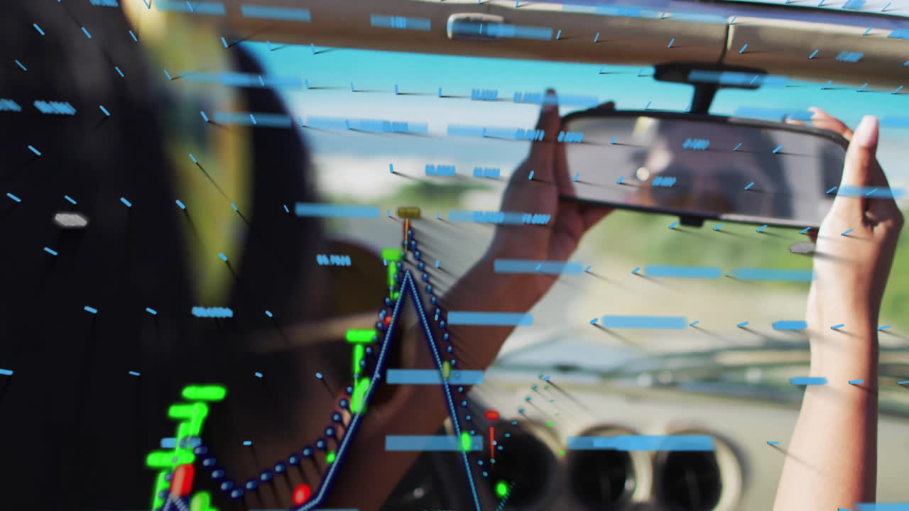 Graph and data animation over person adjusting rearview mirror in car