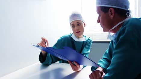 doctor interacting with colleague
