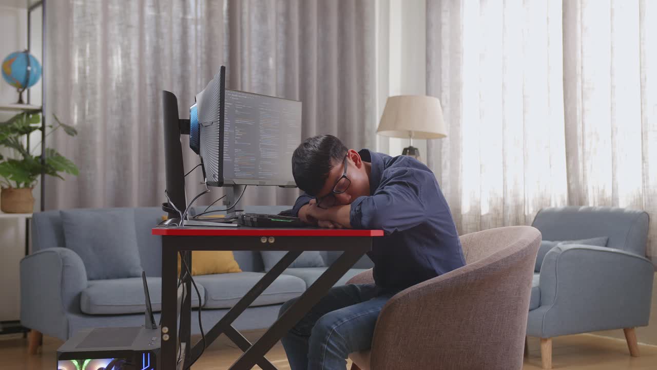 Tired Programmer Taking a Nap at Their Home Office