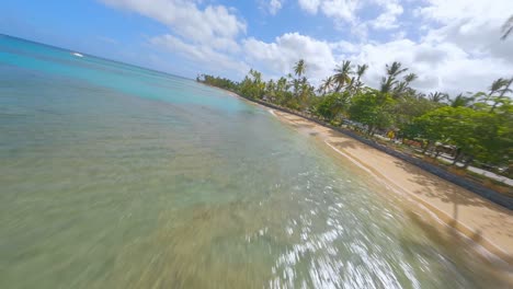 crazy racing drone flight over playa punta popy at las terrenas in dominican republic