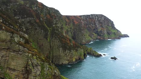 picturesque aerial of beautiful sea cliff coastline of horn head, ireland