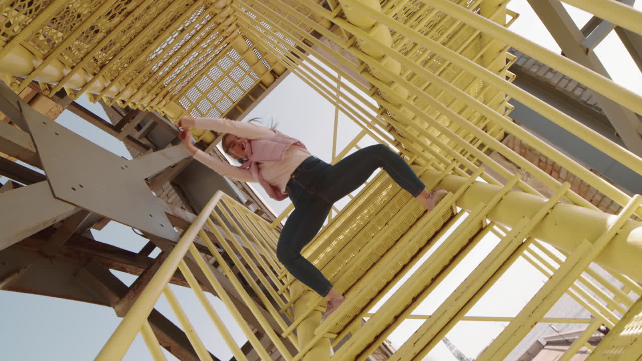 Woman Performing Modern Dance on Stairs