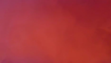 fondo abstracto de movimiento de niebla y niebla en rojo