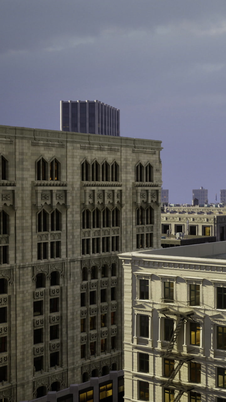 Tall buildings standing next to each other in a city at dusk with cloudy sky