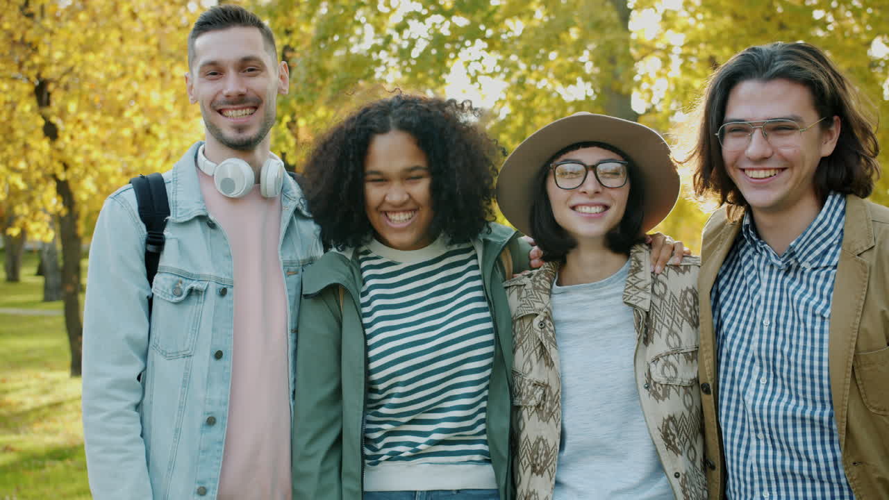 Four Friends Enjoying Autumn in a Park