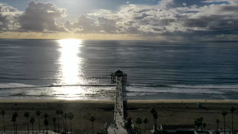 sunset over manhattan beach pier in california