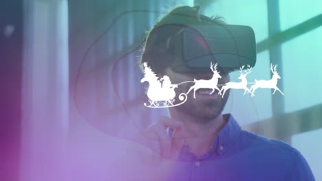 Animation-of-santa-in-sleigh-over-caucasian-man-with-vr-headset