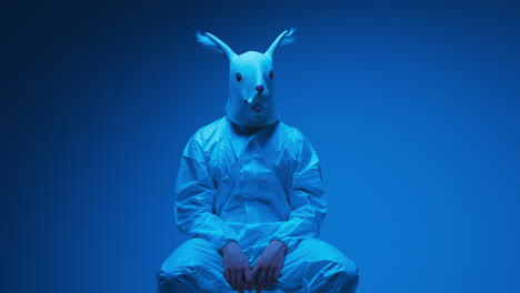 Person in Rabbit Mask and Hazmat Suit