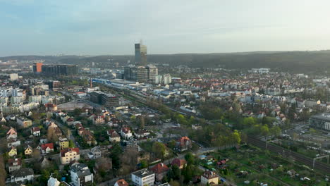 Aerial-establishing-shot-of-Gdansk-Cityscape-in-Poland-during-golden-sunrise