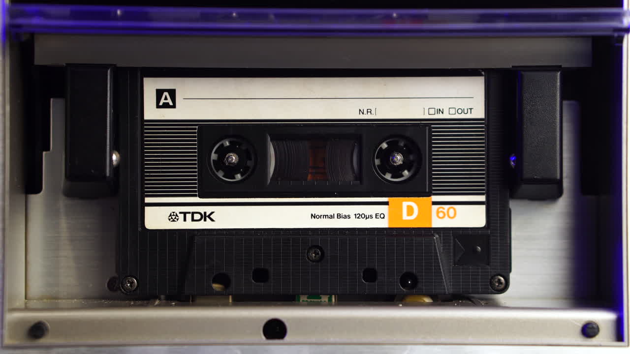 Vintage TDK D60 Cassette Tape in a Tape Deck
