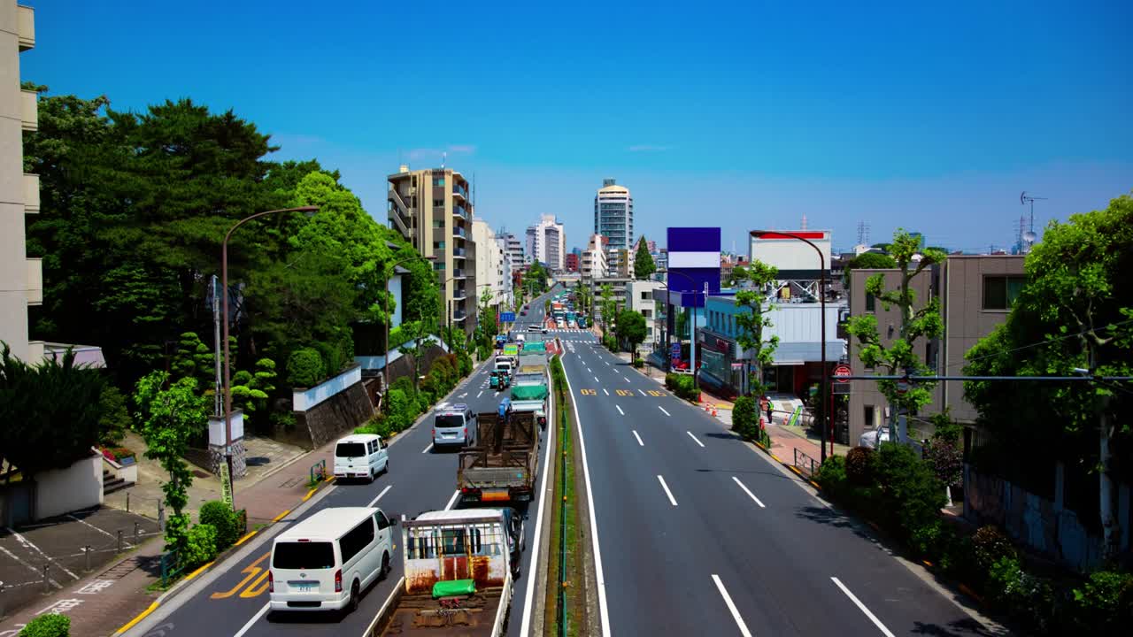 도쿄의 도시 거리에서 교통체증의 타임스 화면