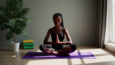 woman meditating in a calm room