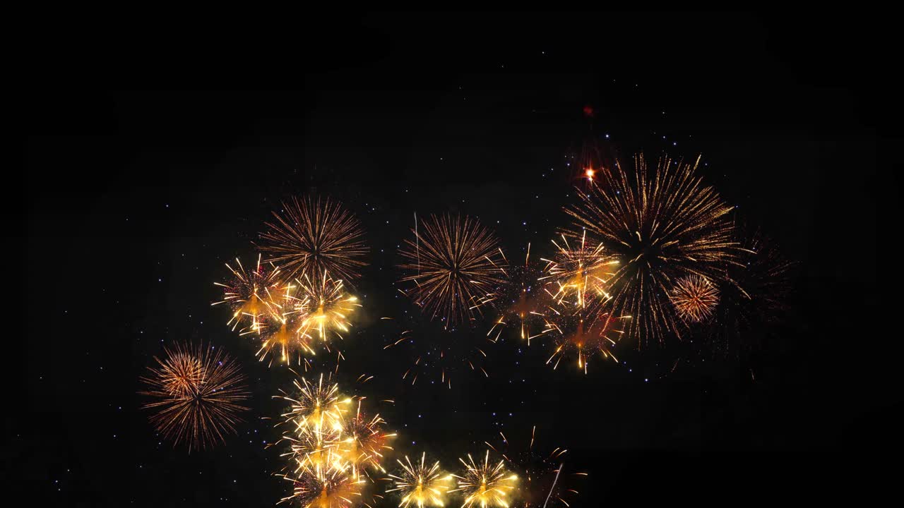 4k abstract multicolor golden shining glowing fireworks show bokeh lights night sky new years eve